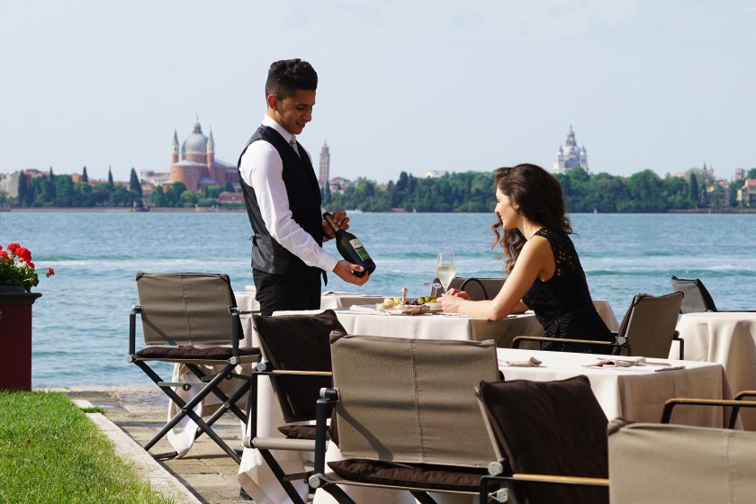 Kempinski Venice_Acquerello terrace with staff and guest II no umbrella_2017